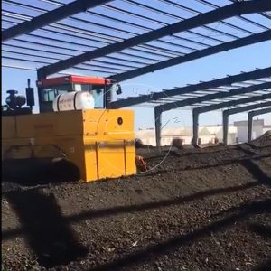 windrow composting machine in an organic fertilizer making plant